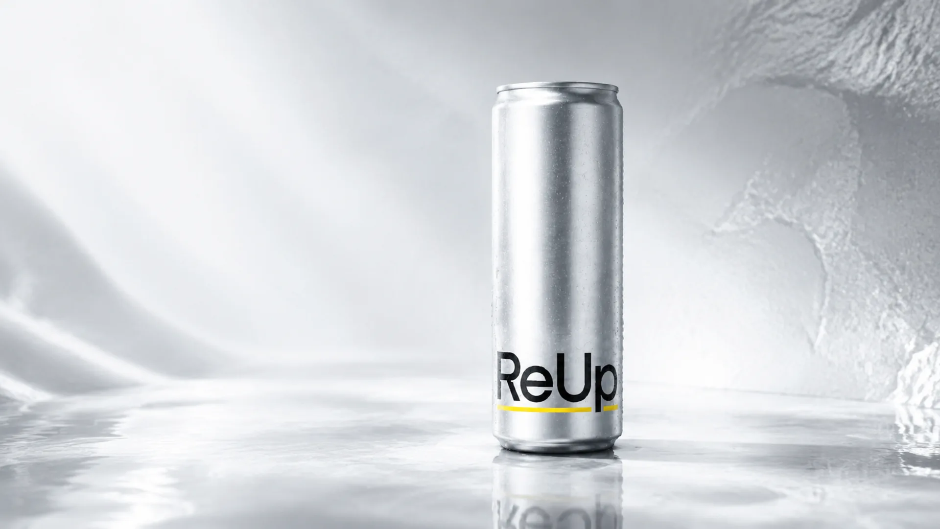 Concept visual of a slim silver 330 mL ReUp can on a pale reflective surface.